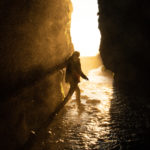 Iceland: Where the Midnight Sun cast a vibrant rainbow before the waterfall