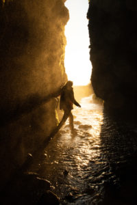 Iceland: Where the Midnight Sun cast a vibrant rainbow before the waterfall